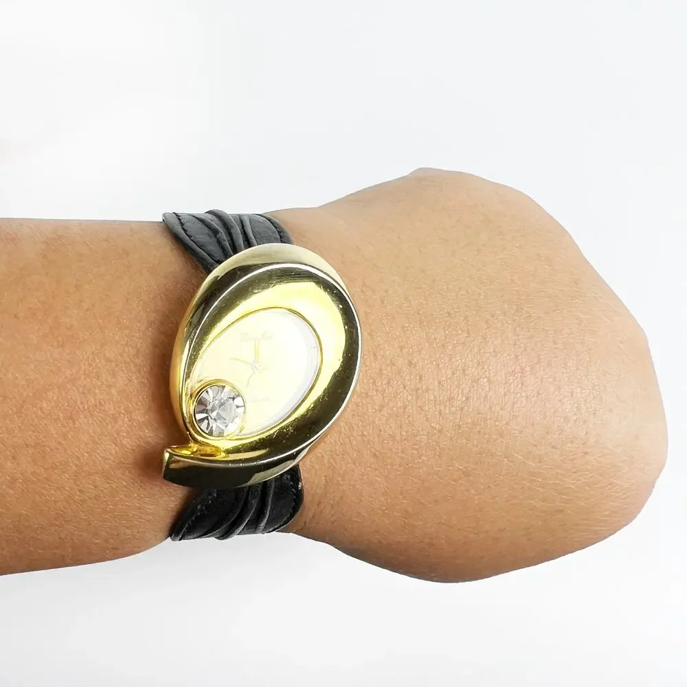 Vintage Renee Nicol quartz watch gold rhinestone diamond and black band working